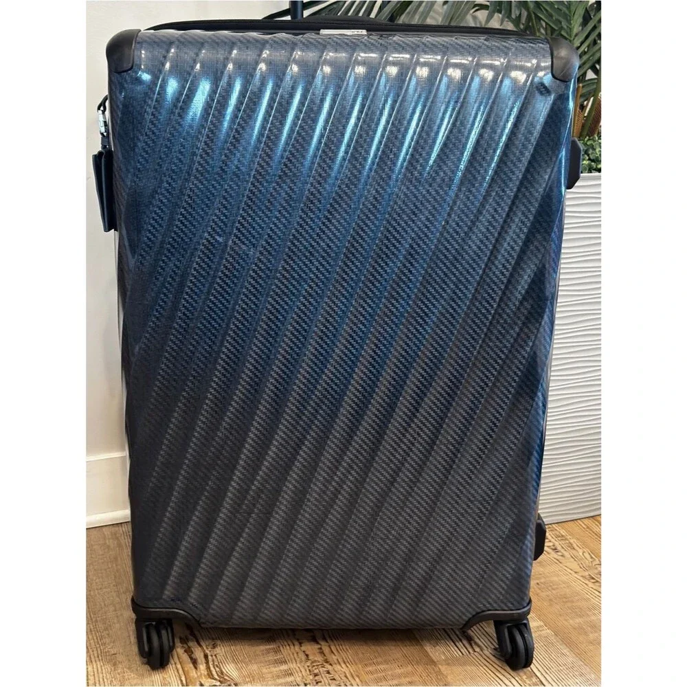 Tumi Large Expandable Checked Glossy Navy Hard-Shell Spinner Luggage suitcase